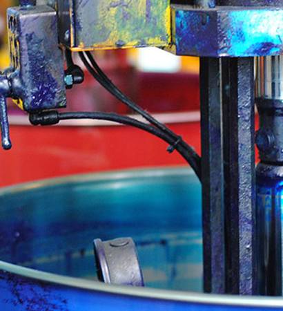 Huge cans of paint in four colors at typography_02.